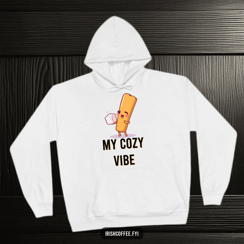 Funny hoodie graphic of a winking cinnamon stick artfully balancing a sugar cube, perfect for cozy and amusing wear.
