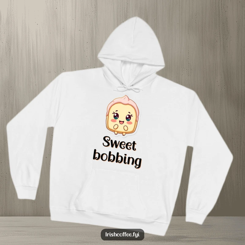 Funny hoodie featuring a delighted pastry shard bobbing cheerfully, providing cozy comfort with a sweet and humorous twist.